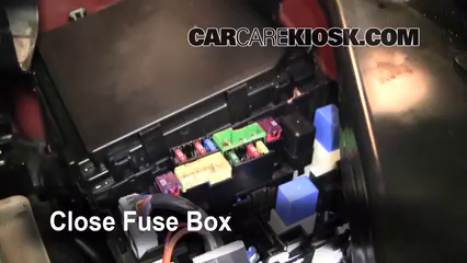 where is the fuse box on a 2013 nissan rogue